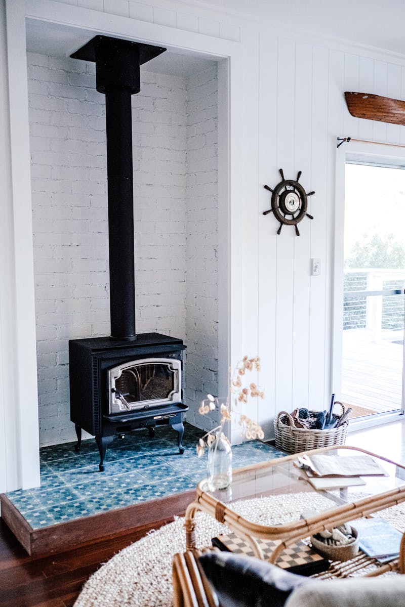 Wood burning stove installed in a bright living room
